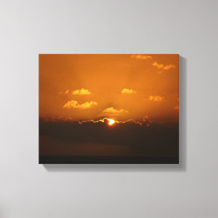 Sol bakom moln I Orange Solnedgång Foto Canvastryck