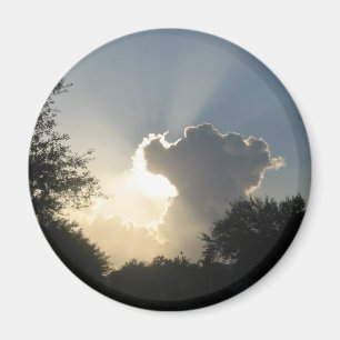 Sol brinner genom CloudsMagnet Magnet
