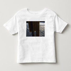 Sol- paneler av den internationella t-shirt