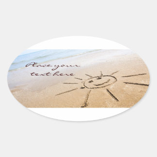Sol vid stranden ovalt klistermärke