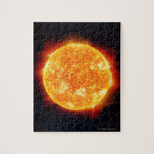 Sol visar solstrålningar mot en stjärna pussel