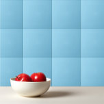 Solblått färg kakelplatta<br><div class="desc">Fast blå design för färg i arktisk form.</div>