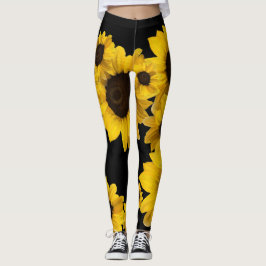 Solblommor i svart gult på svart bakgrund leggings