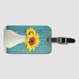 Solblommor i vas bagagebricka