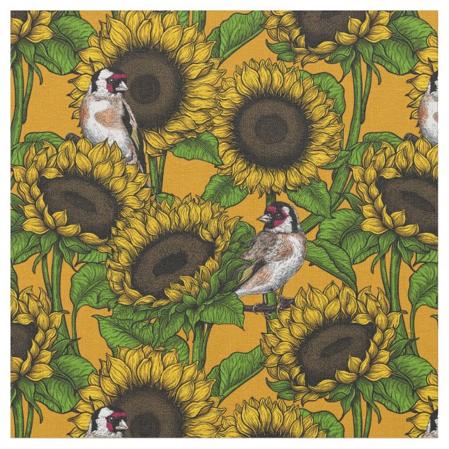 Solblommor och guldfinkar på orangen tyg (Närbild)