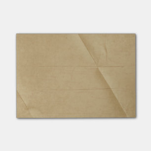 Solbränd kräm vikt skrynklig bakgrund post-it block