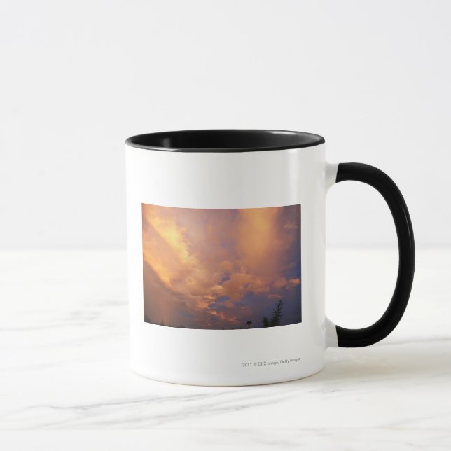 Solinställning bak moln mugg (Höger)
