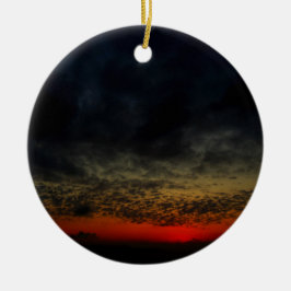 Solnedgång före stormen julgransprydnad keramik