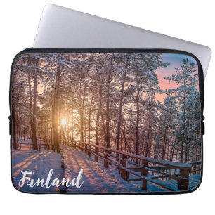 Solnedgång i gräs-snöskog med sol-stråle laptop fodral