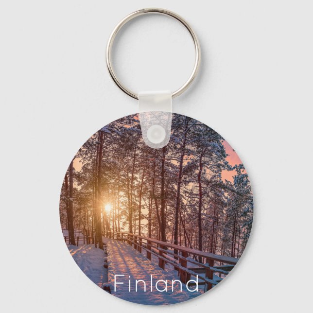 Solnedgång i gräs-snöskog med sol-stråle nyckelring (Framsida)