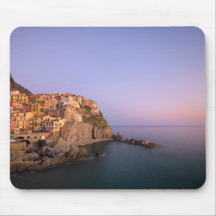 Solnedgång över den Manarola byn i Cinque Terre Musmatta