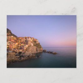 Solnedgång över den Manarola byn i Cinque Terre Vykort