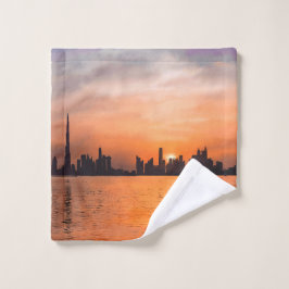 Solnedgång över en kuststad - akvarell