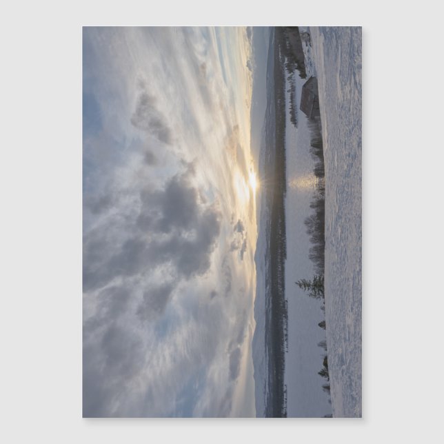 Solnedgång över fryst sjö (Framsida)