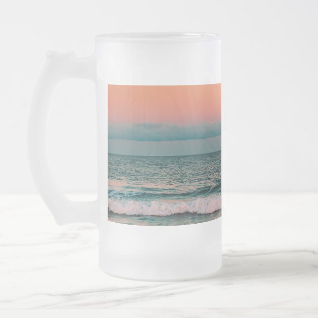 solnedgång över havet frostat ölglas (Vänster)