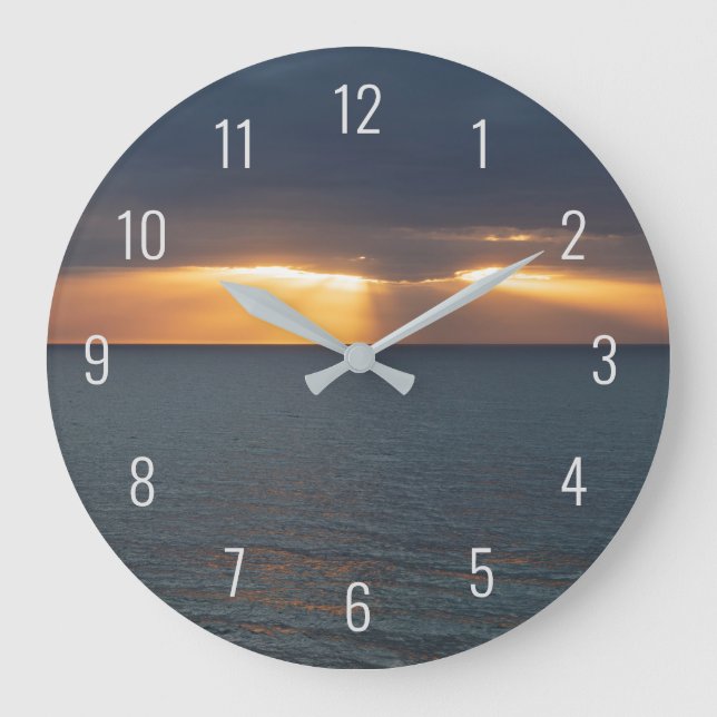 Solnedgång över havet genom molnen stor klocka (Framsida)