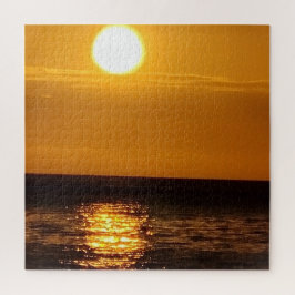 Solnedgång över havet pussel