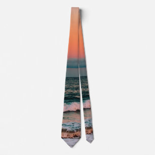 solnedgång över havet slips