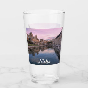 Solnedgång över småkanalen i Cospicua, Malta Glaskopp