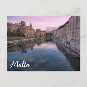 Solnedgång över småkanalen i Cospicua, Malta Vykort