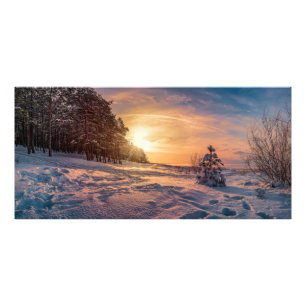 Solnedgång över snöig vinter havskust fototryck