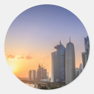 Solnedgång över staden av Doha, Qatar Runt Klistermärke