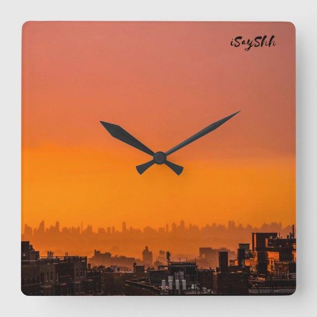 Solnedgång över staden fyrkantig klocka (Framsida)