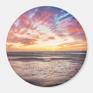 Solnedgång över strand och hav magnet