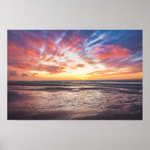 Solnedgång över strand och hav poster
