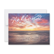 Solnedgång över strand och hav