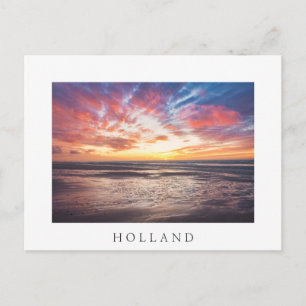 Solnedgång över strand och hav vykort