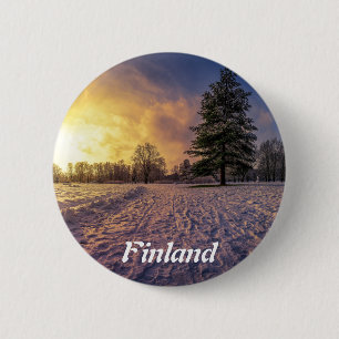 Solnedgång över vinterparken knapp