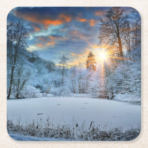 Solnedgång över vinterskog sjön underlägg papper kvadrat