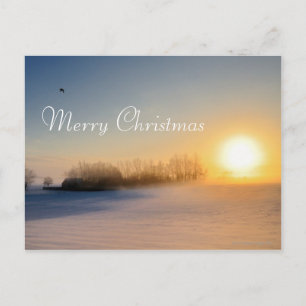 Solnedgång på juldagen i bygd helg vykort