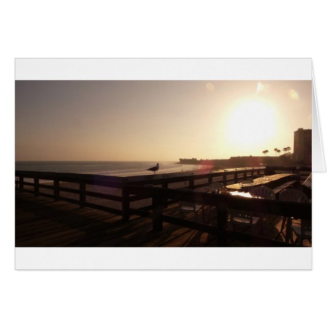Solnedgång på pir hälsningskort (Framsidan Horizontal)