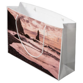 Solnedgång på Reynisfjaras svarta sandstrand, Isla