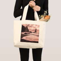 Solnedgång på Reynisfjaras svarta sandstrand