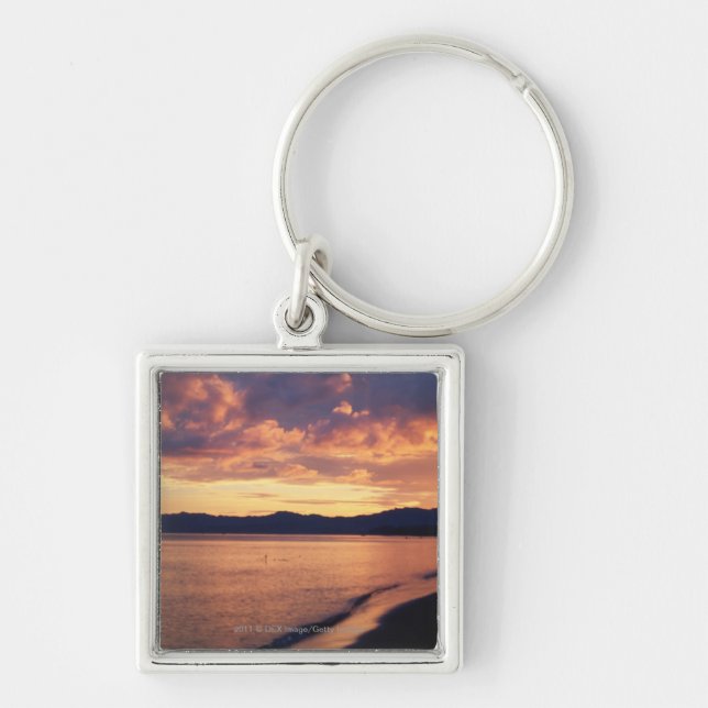 Solnedgång på stranden fyrkantig silverfärgad nyckelring (Framsidan)