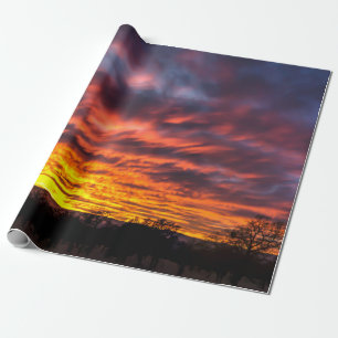 Solnedgång som slår in papper presentpapper