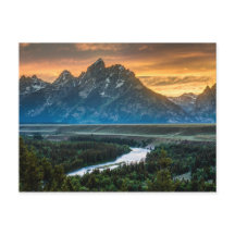 Solnedgång vid Grand Teton och Snake River
