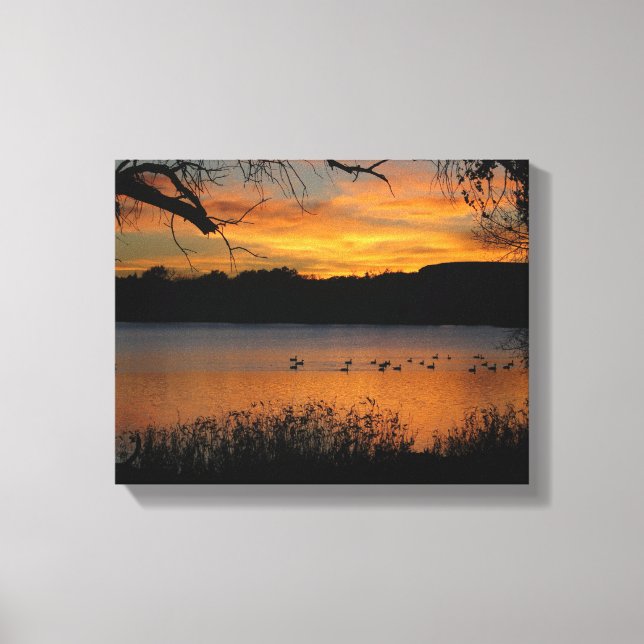 Solnedgång vid Sjö-utskriften på arbetsytan Canvastryck (Framsida)