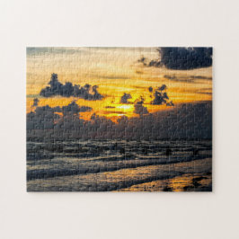 Solnedgång vid stranden pussel