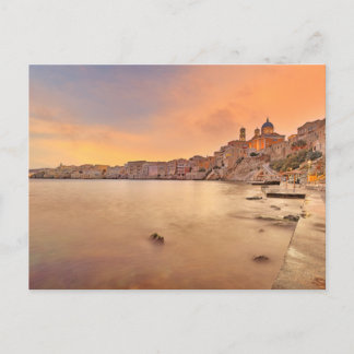 Solnedgången i Agios Nikolaos på ön Syros Vykort