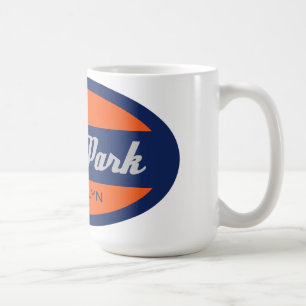 Solnedgången parkerar kaffemugg