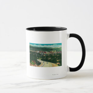 Solnedgånghuvudväg som skriver in Spokane från Mugg