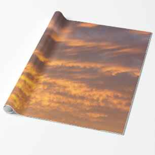 Solnedgångmoln som slår in papper presentpapper