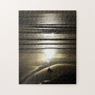 Solnedgångsurfare på det Polzeath pussel