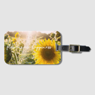 Solros citat "blommor är lycka" bagagebricka