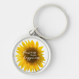 Solros citat "blommor är lycka" rund silverfärgad nyckelring