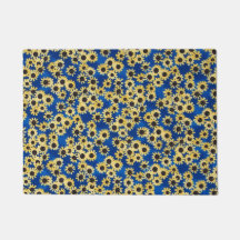 Solros på blåttdörrmatta